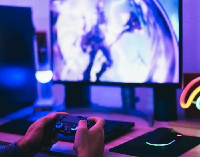 hands-play-video-game-with-colorful-neon-lighting-2026-03-19-03-00-00-utc (1)